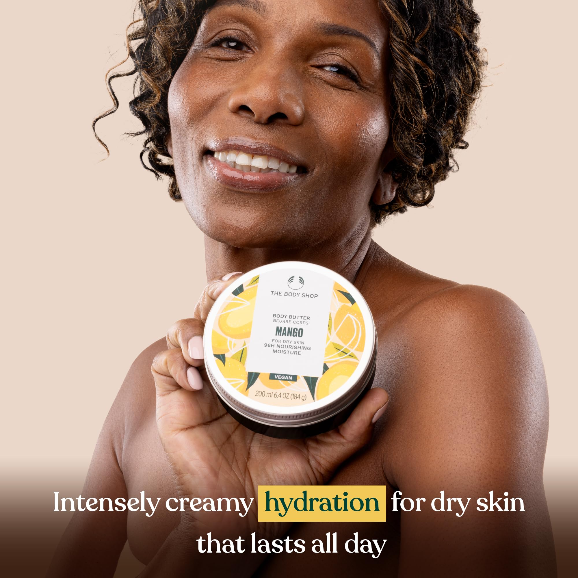 The Body Shop Mango Body Butter dans un pot en plastique recyclé à 100 %.