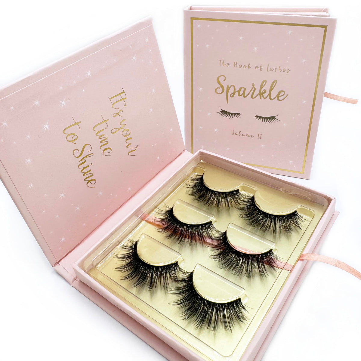 The Book of Lashes Sparkle 3D faux mink lashes for dramatic volume.