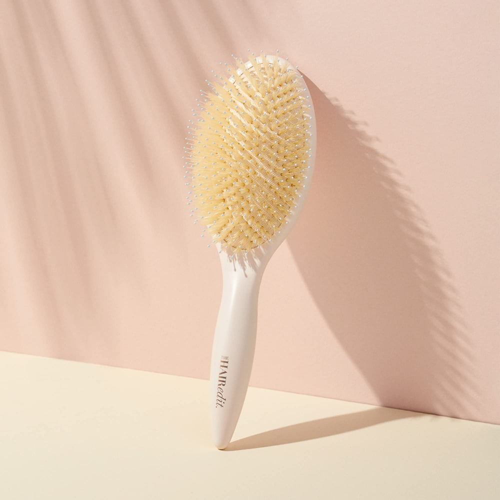 The Hair Edit brosse-cheveux-secs facilite le démêlage et la mise en forme des cheveux secs.
