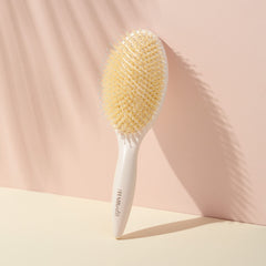 The Hair Edit brosse-cheveux-secs facilite le démêlage et la mise en forme des cheveux secs.