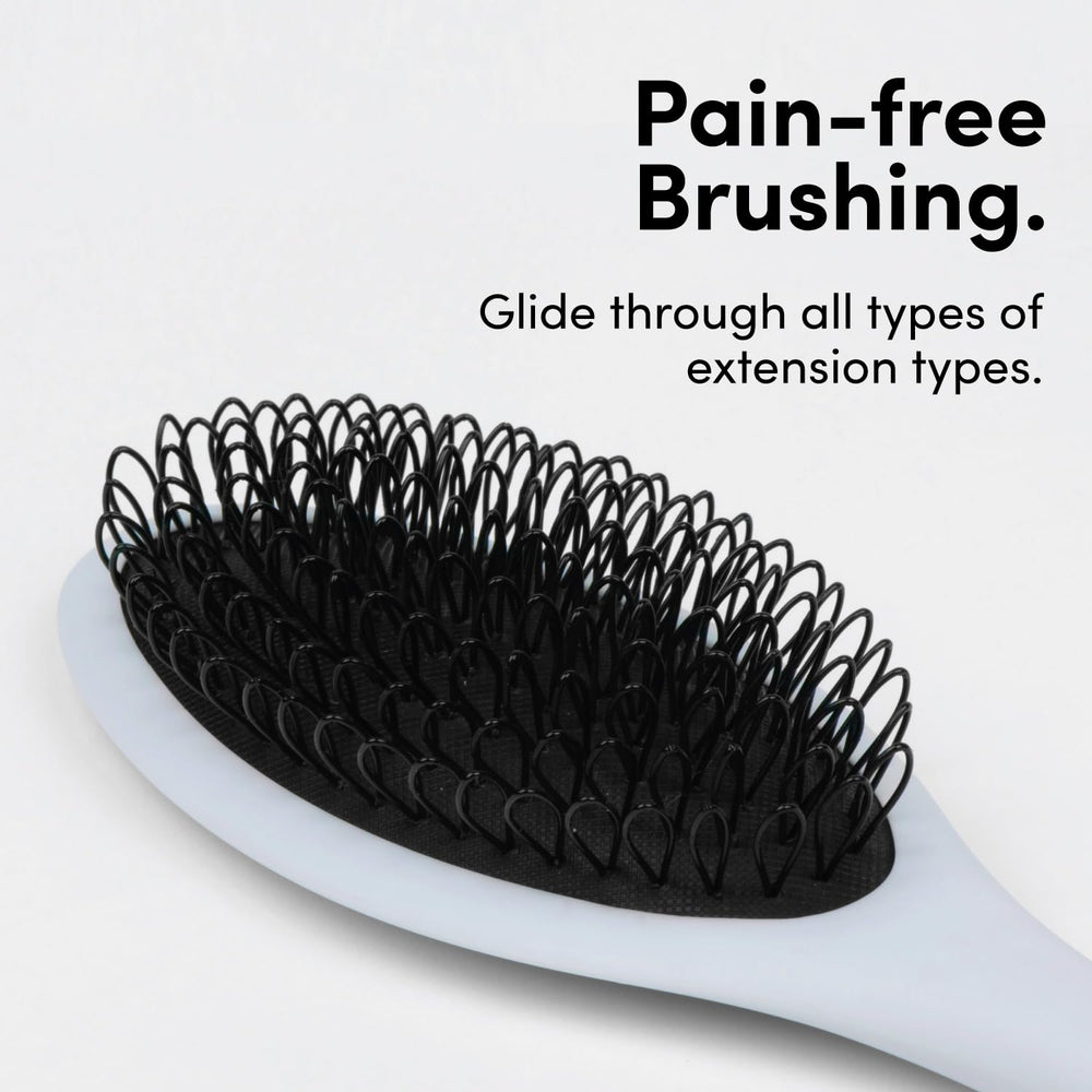 Brosse The Hair Shop anti-noeud, évite les accroches sur bonds.