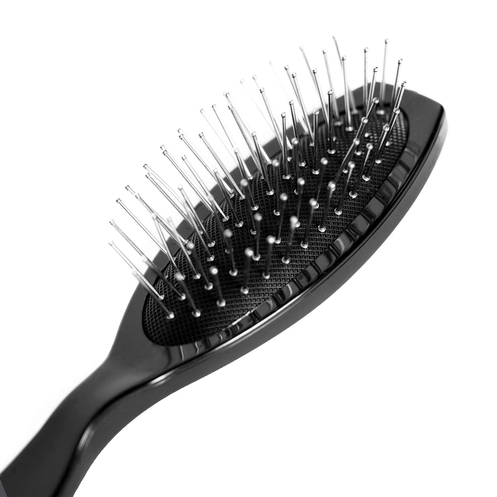 The Hair Shop: manche ergonomique pour un demelage doux et precis.