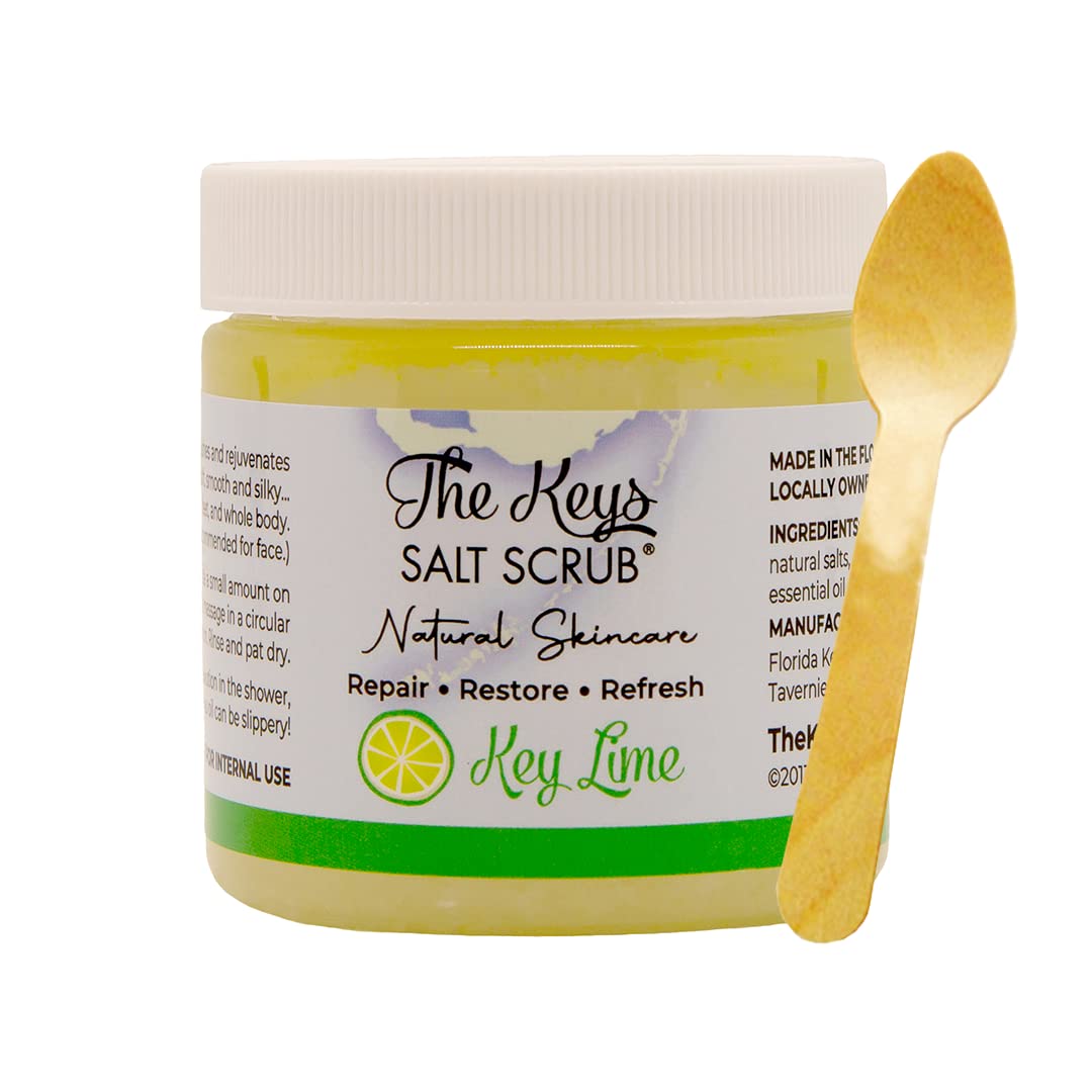The Keys Salt Scrub wooden spoon beside the jar for easy scooping.