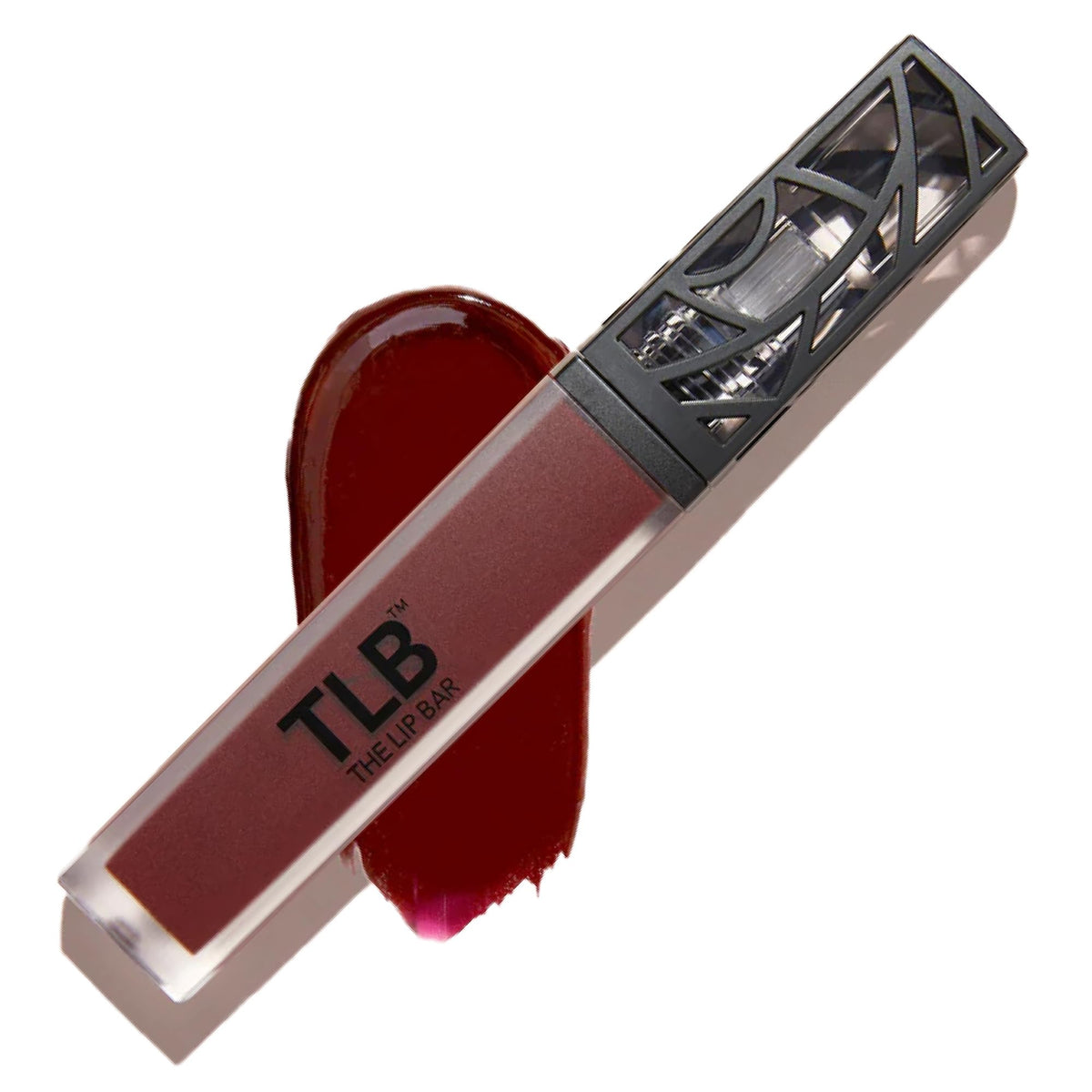 The Lip Bar Rebel Liquid Matte, teinte rouge profond, bouteille élégante et tenue longue durée