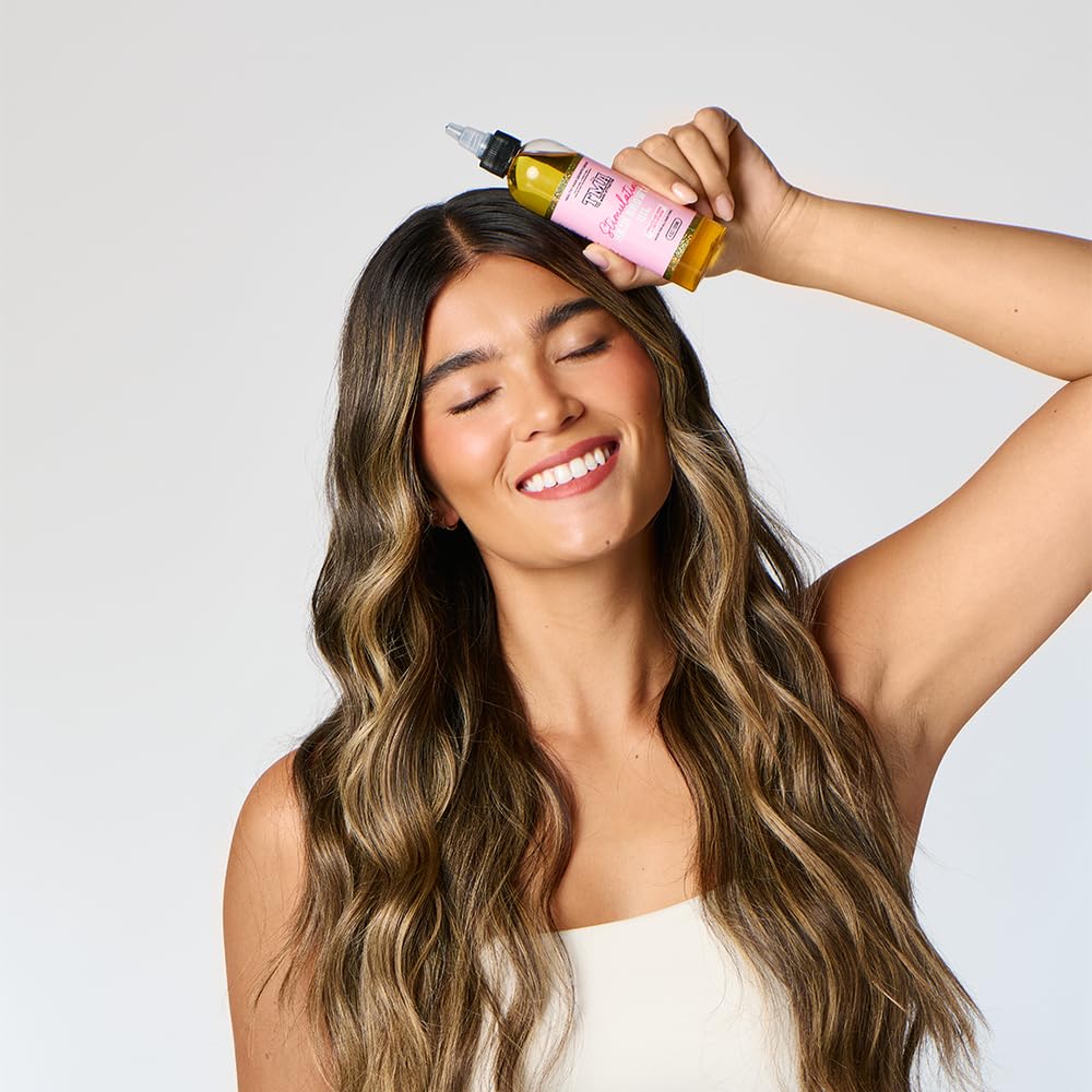 Résultat après application: cheveux lustrés et soyeux grâce à The Mane Attraction.