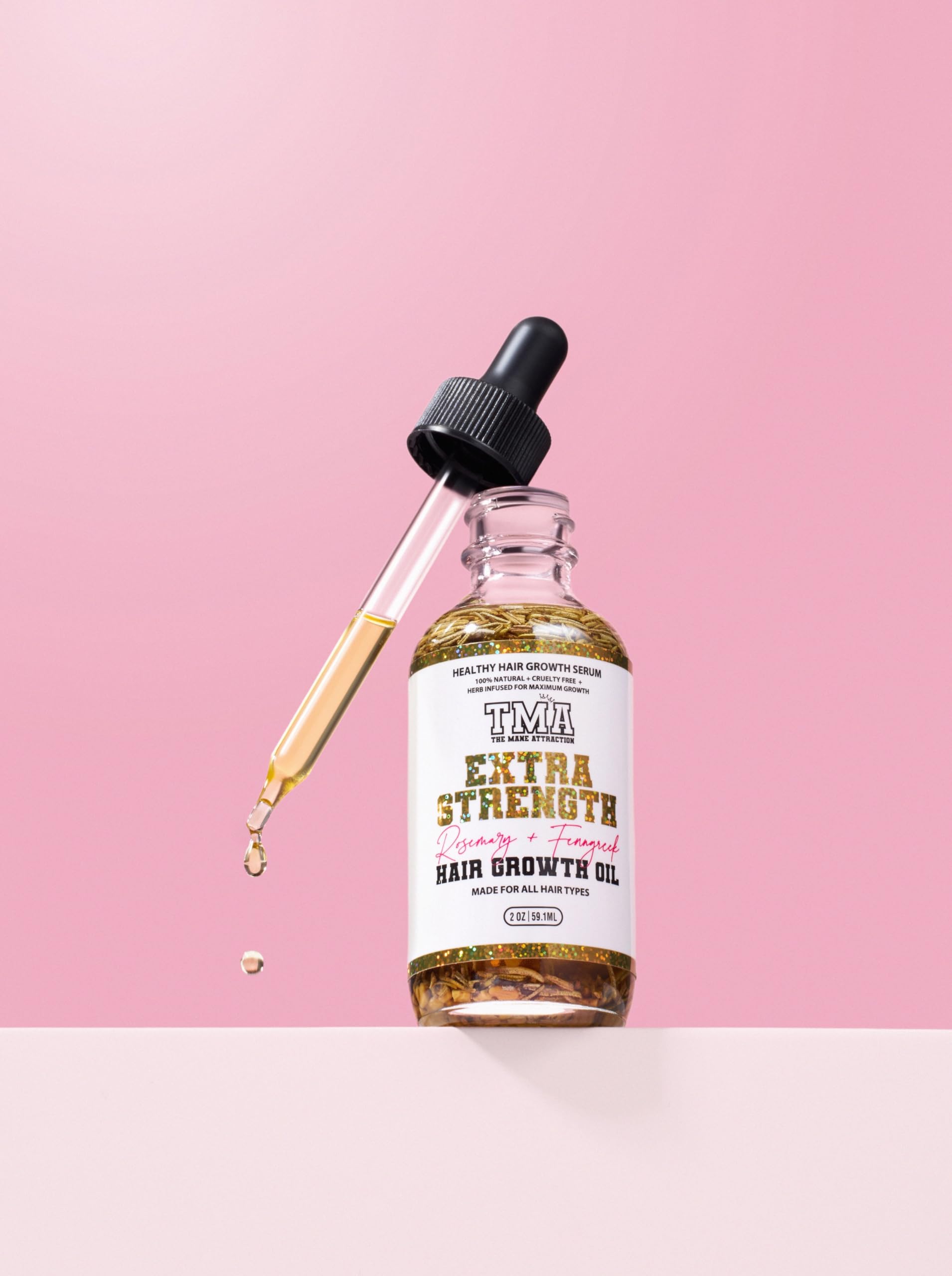 The Mane Attraction emballage mini format 2oz, parfait pour le voyage.