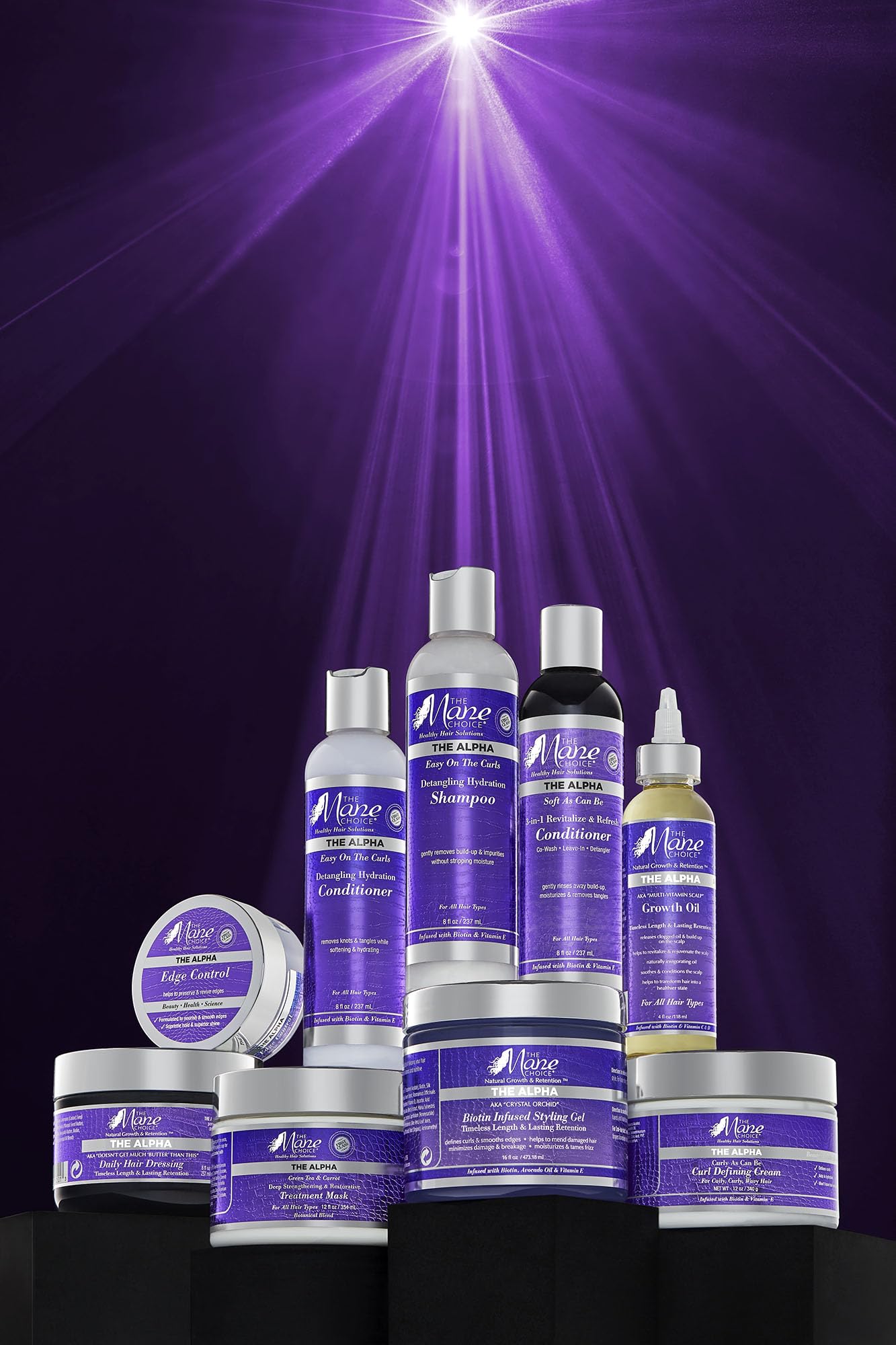 The Mane Choice Alpha Curly Cream enrichie en biotine et vitamine E pour nourrir les cheveux.