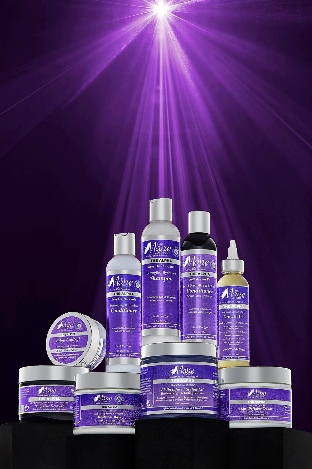 The Mane Choice Alpha Curly Cream enrichie en biotine et vitamine E pour nourrir les cheveux.