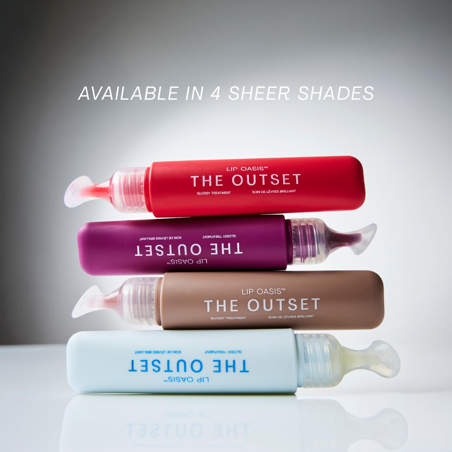 The Outset Lip Oasis fini gloss soigné, non collant, idéal sur lèvres nude ou maquillées.