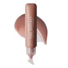 The Outset Lip Oasis flacon-applicateur offrant une hydratation durable des lèvres.