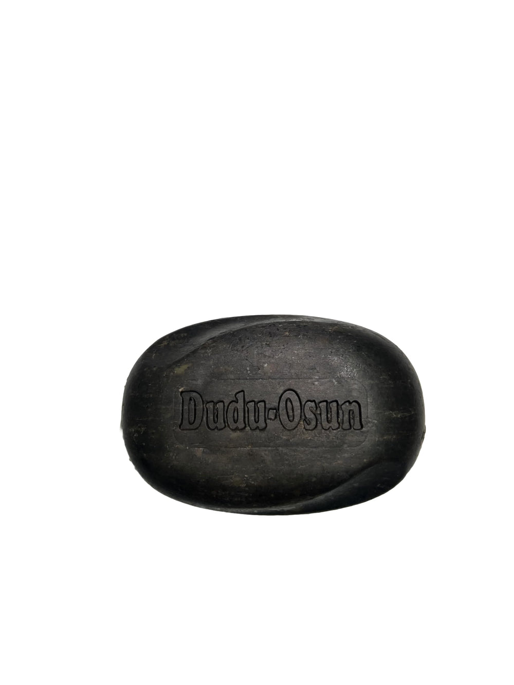 Texture riche et parfum frais du savon noir Dudu Osun pour la peau.