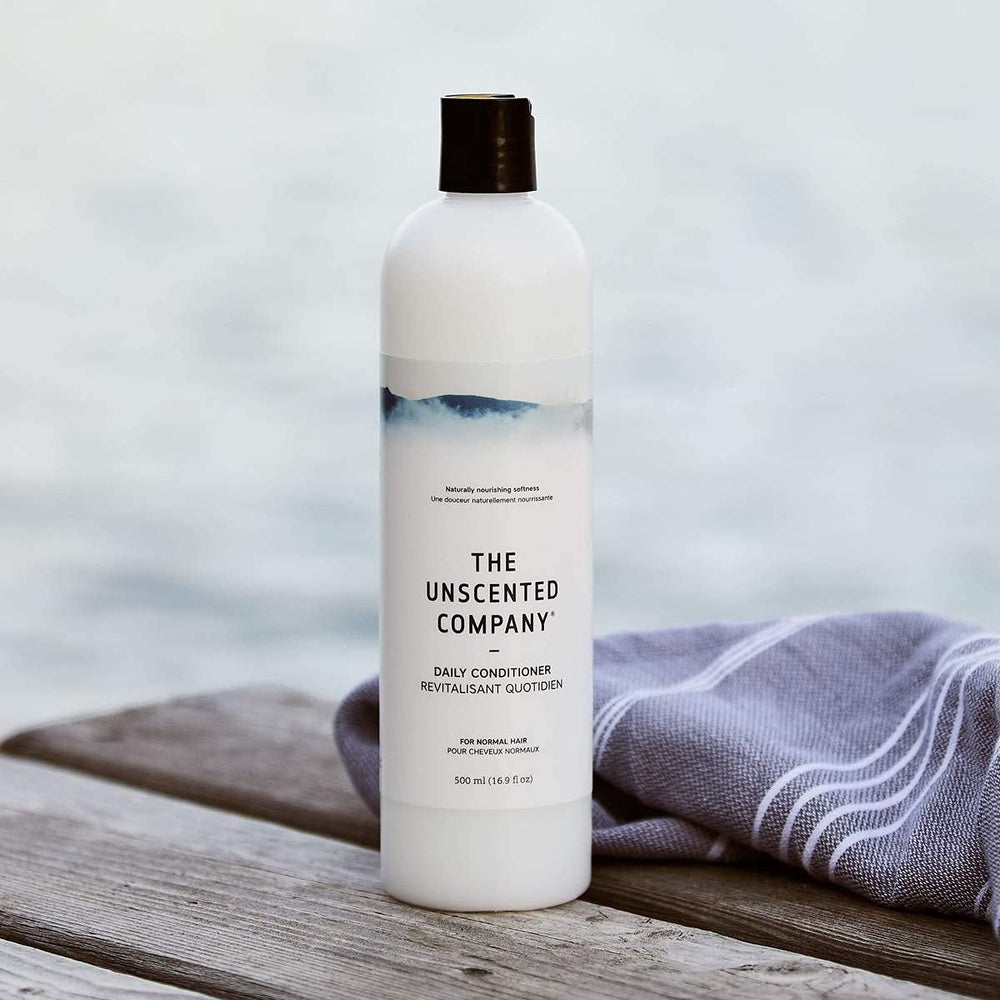 Texture crèmeuse du conditionneur The Unscented Company pour démêlage facile