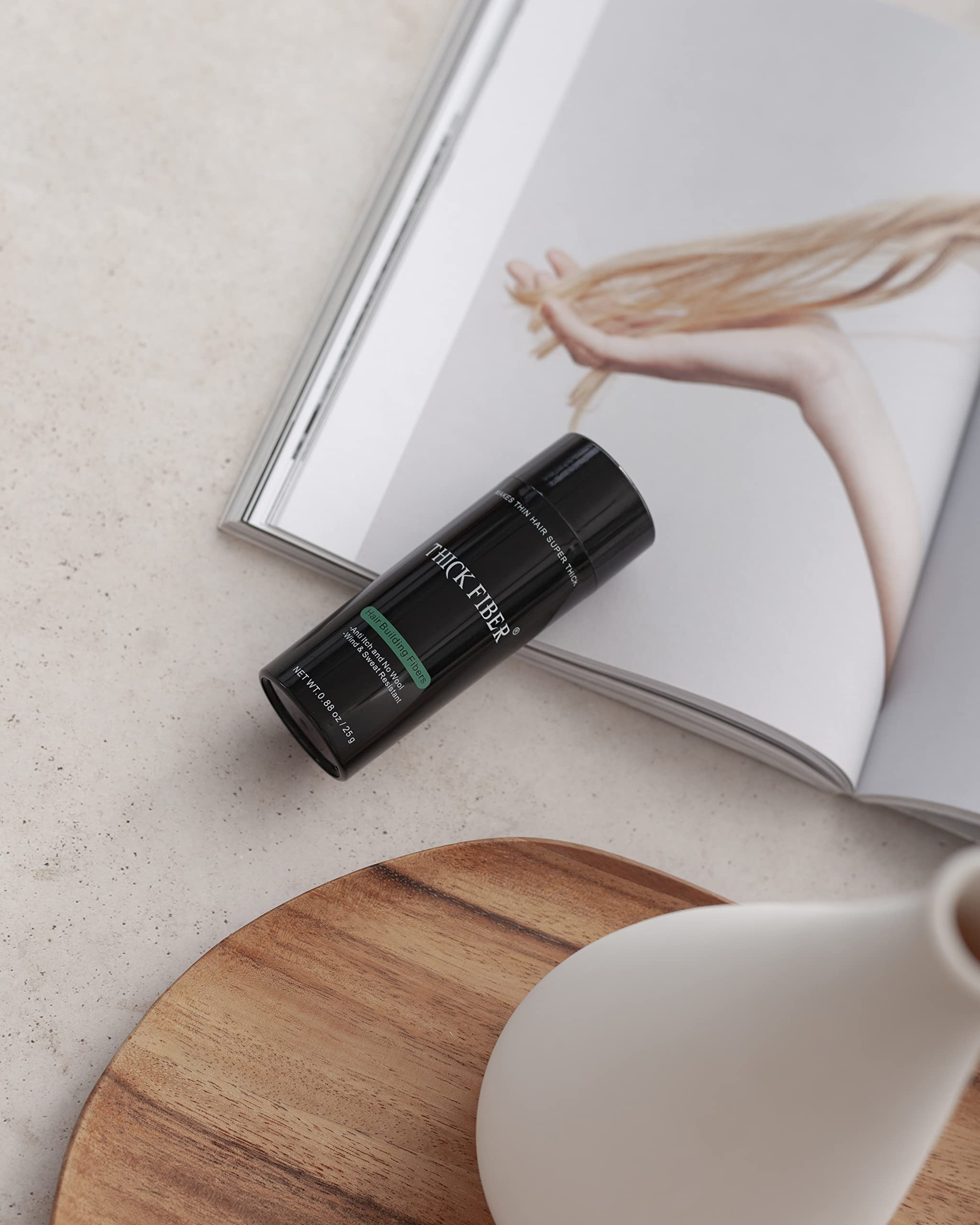 Thick Fiber applied to thinning areas for quick, natural-looking fullness.