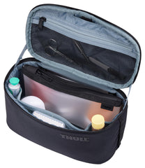 Trousse Thule Subterra, sangle rabattable pour rangement.