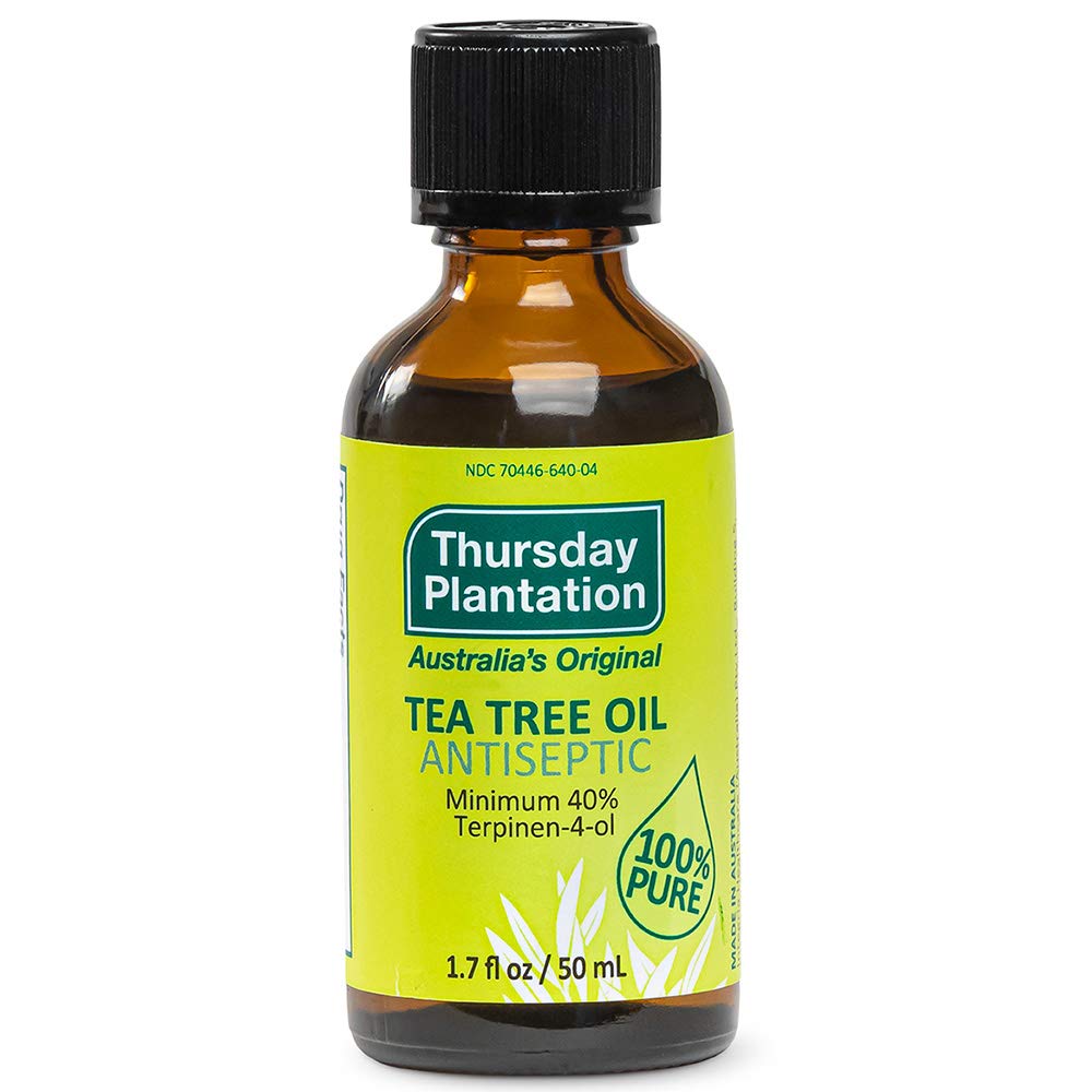 Thursday Plantation Tea Tree Oil bottle close-up for skin cleansing.