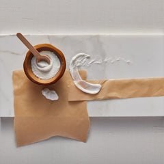 Étiquette élégante de la lotion Thymes Aqua Coralline, cadeau raffiné.
