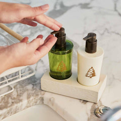 Lotion mains Thymes Frasier Fir, emballage artisanal évoquant la nature.
