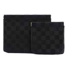 Pochette Tiltol maquillage petite noire à carreaux, compacte et organisée.