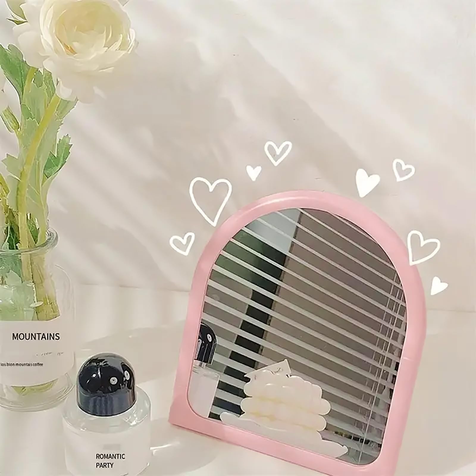 TOBETOPTOOLER Miroir décor arc rose: élément chic et pratique dans le salon.