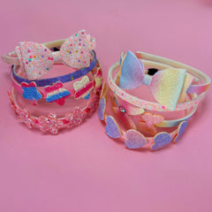Bandeau Tomolucky Direct arc-en-ciel avec paillettes, parfait pour fête ou séance photo.