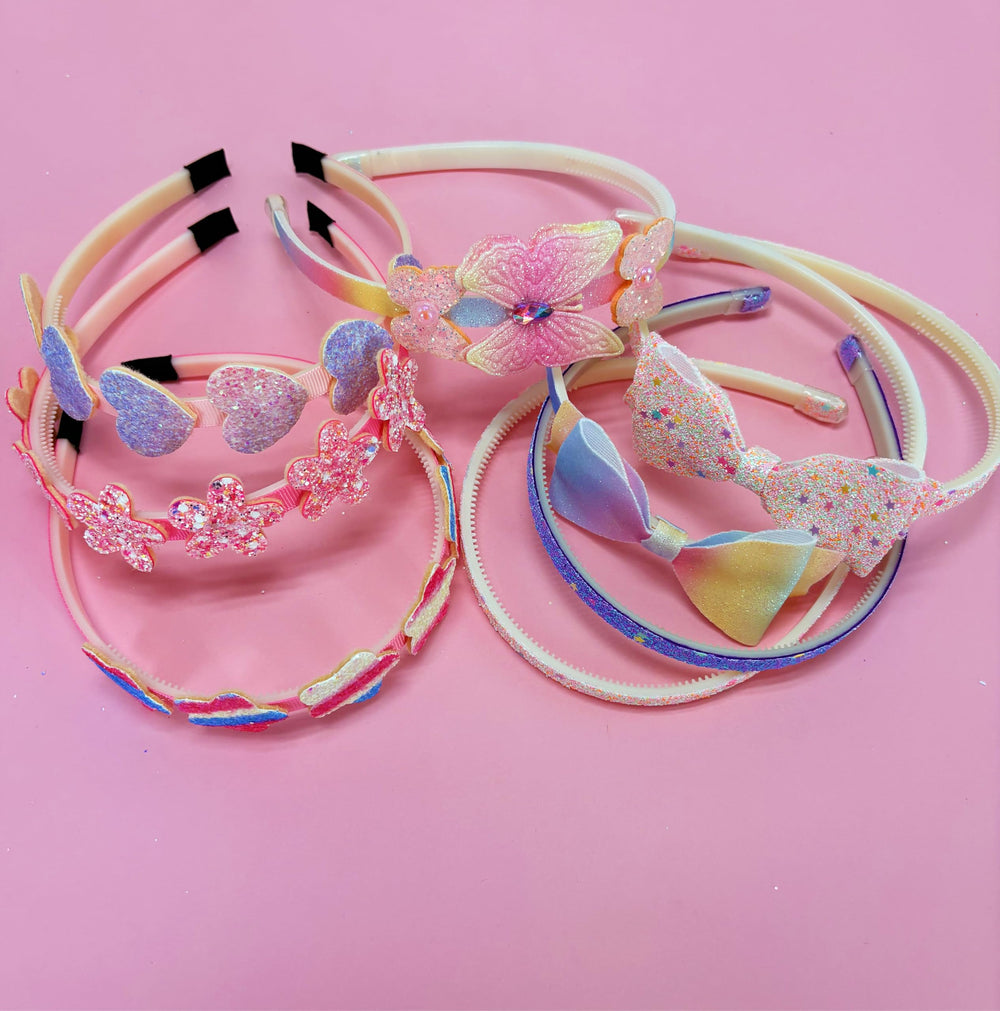 Bandeau Tomolucky Direct pailleté avec nœud brillant, idéal pour une tenue chic.