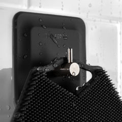 Gant TOOLETRIES et gel douche pour un massage revitalisant.