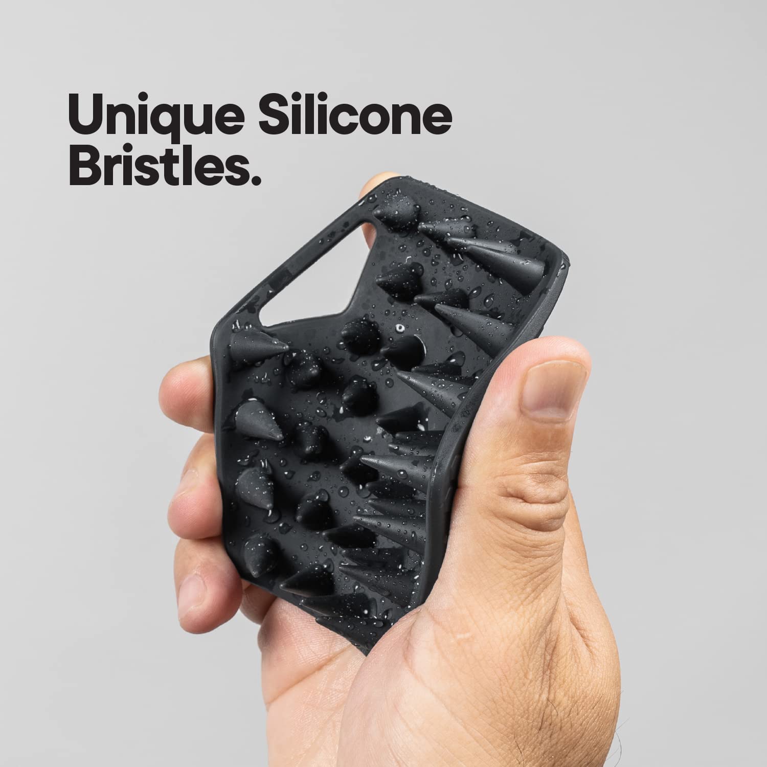 TOOLETRIES crochet-douche-silicone facilite le séchage et le rangement.