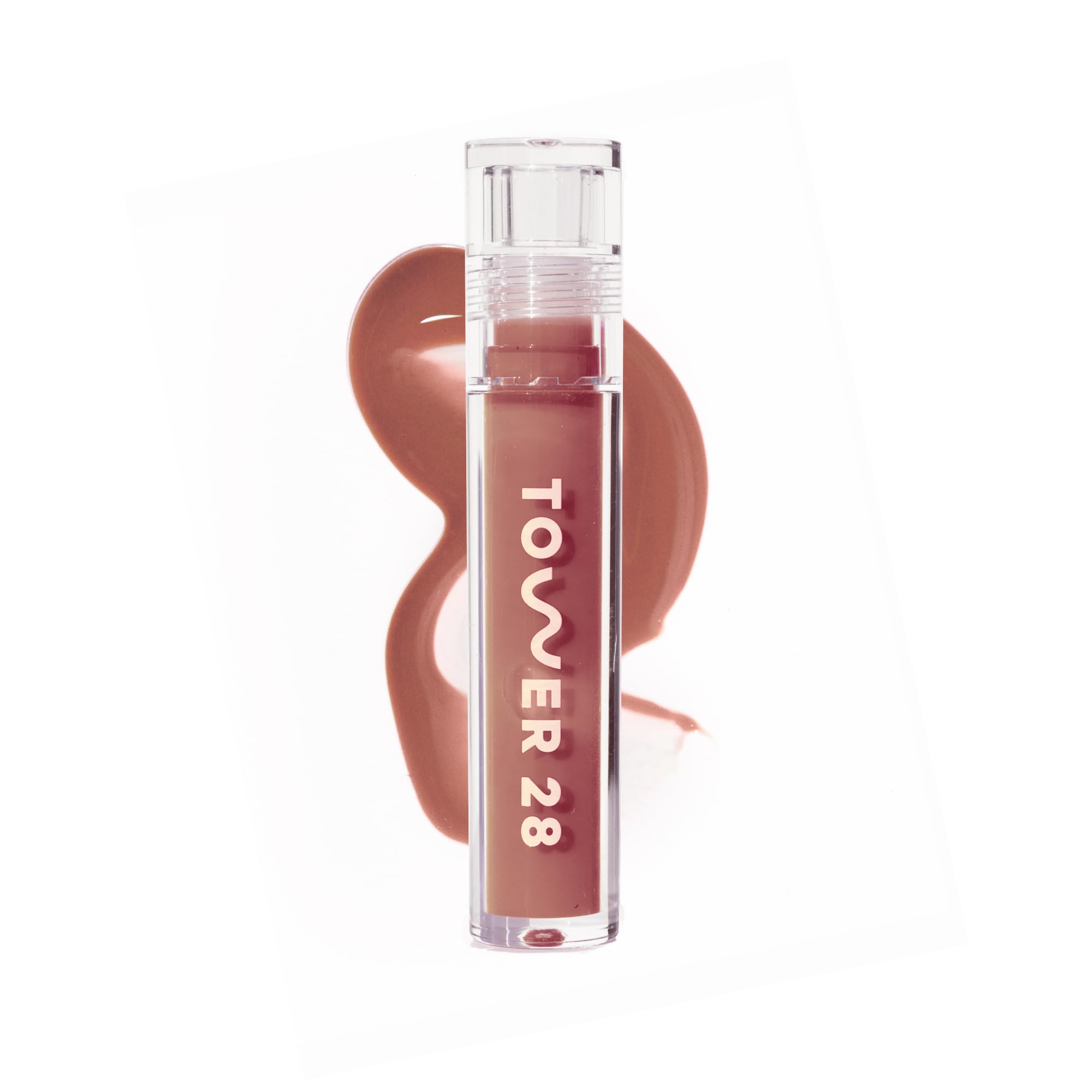 Tower 28 ShineOn Jelly teinte Cashew sur lèvres pour hydratation et brillance.
