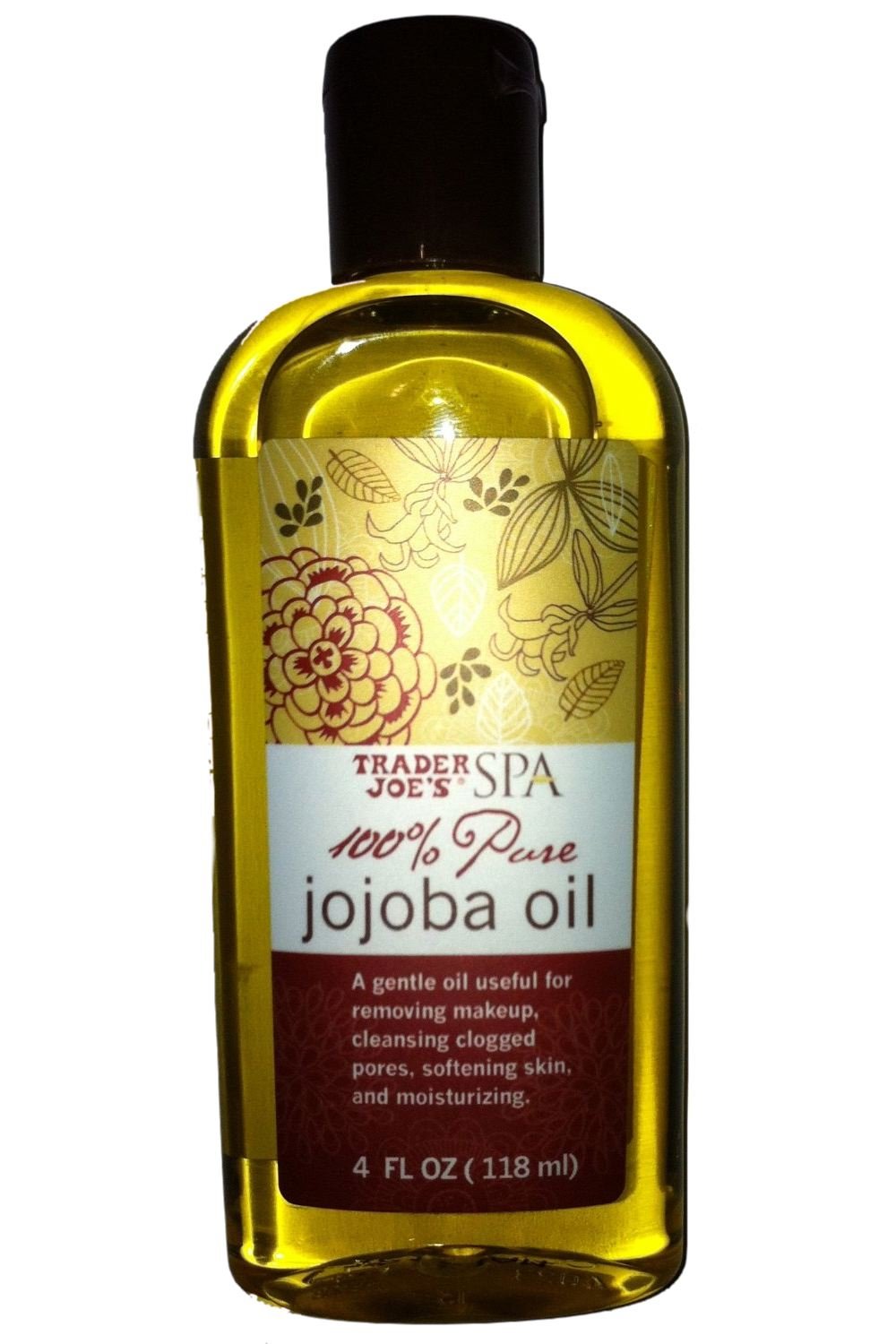 Huile jojoba pure Trader Joe's dans une bouteille; hydratation légère pour peau et cheveux.