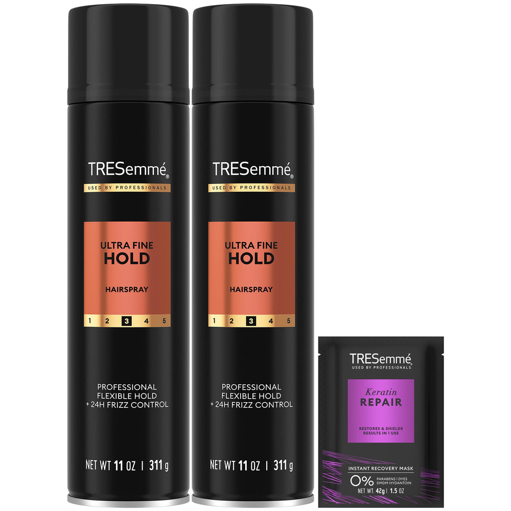 Bouteille TRESemmé Hairspray brume fine pour tenue légère toute la journée.