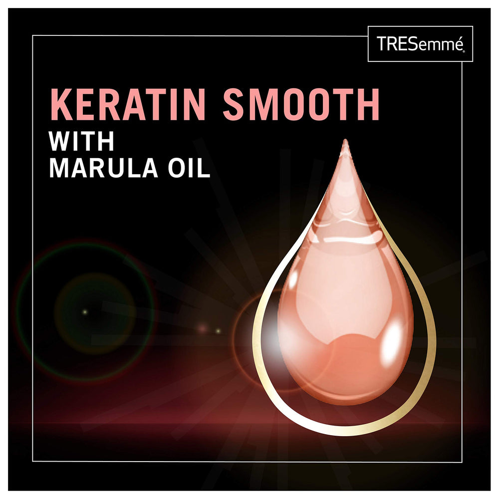 Close-up of frizz control on sleek hair with TRESemmé Keratin Smooth.