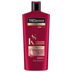 TRESemmé Keratin Smooth Shampoo bottle shows frizz control and smooth movement.