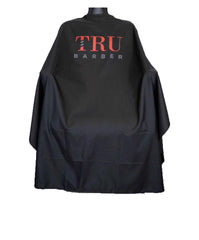 Cape TRU BARBER avec cou en silicone et fermeture à pression, confort accru.