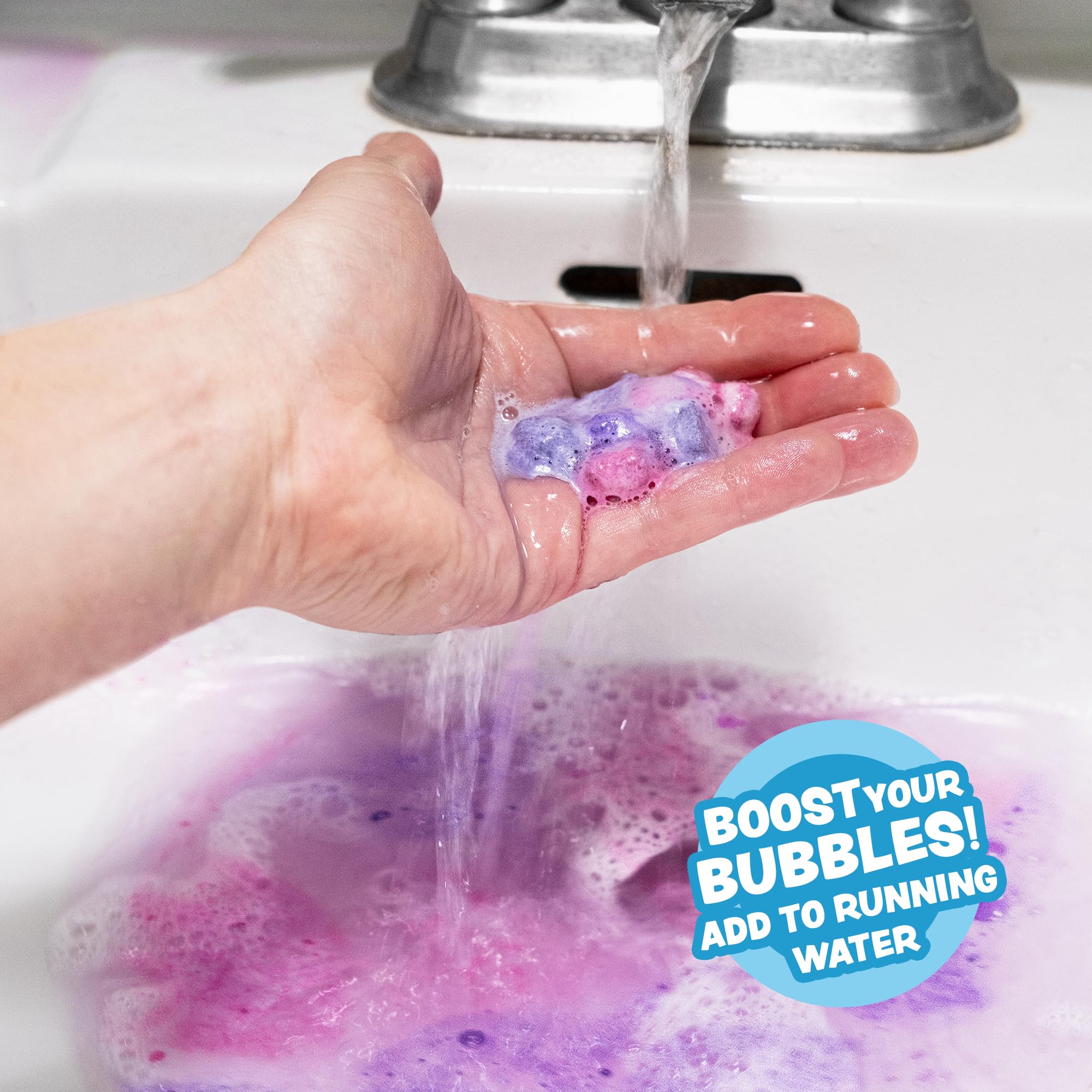 Tub Works Lil' Bursts cosmiques art-bain: dépose des couleurs et des formes pour une baignade imaginative.