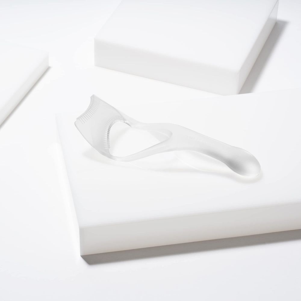 Tweezerman Lash Guard & Comb: application précise pour un regard maîtrisé.