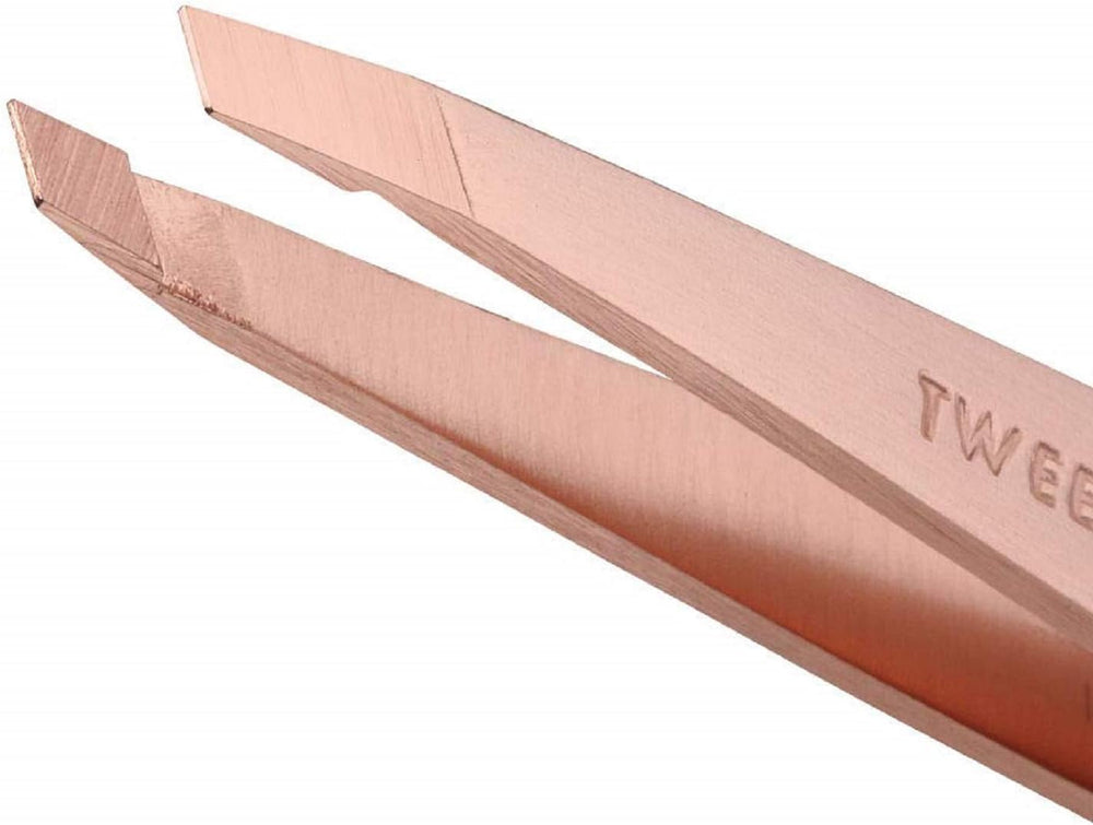 Pinces Tweezerman inox rose dore avec alignement parfait et durabilite