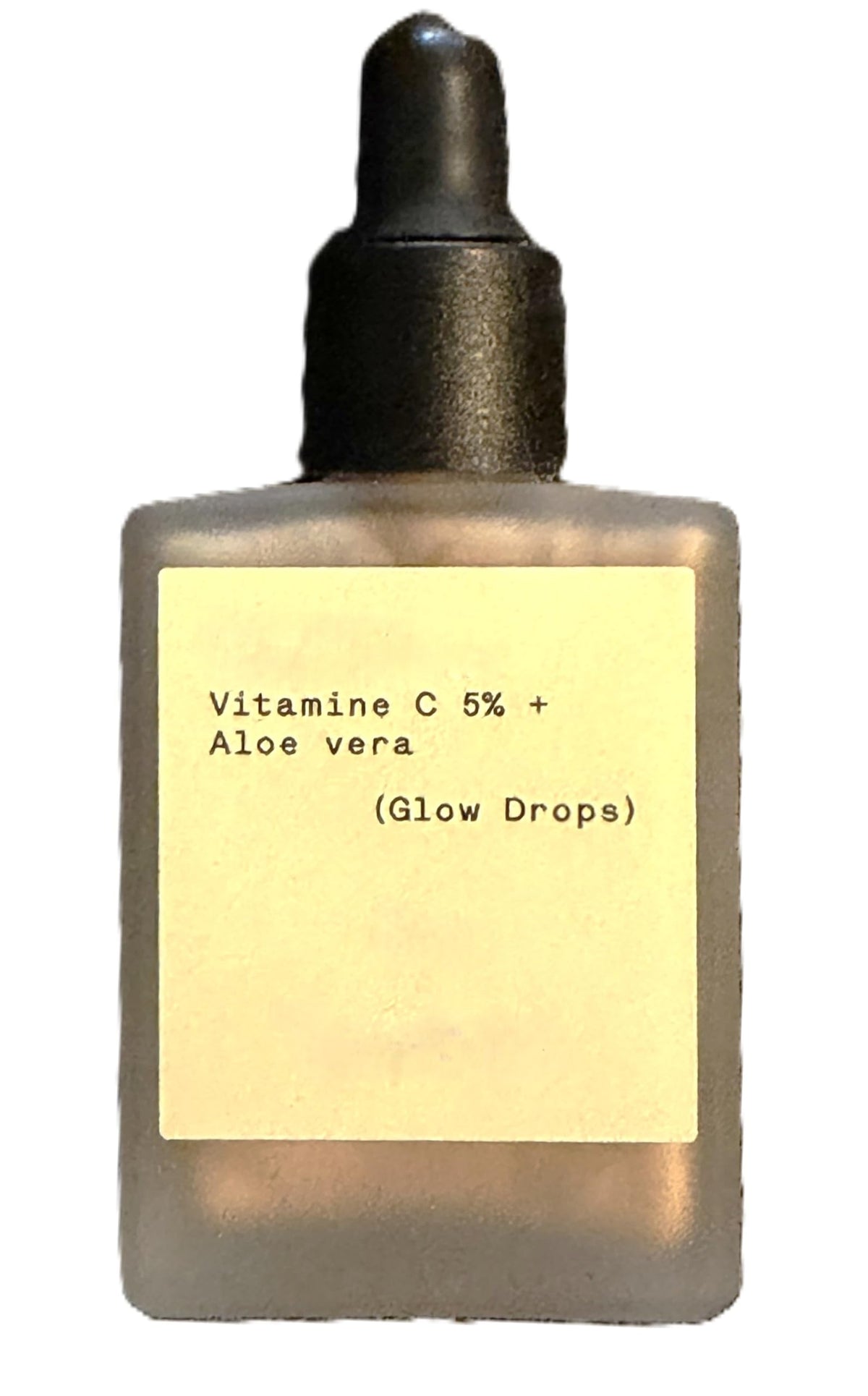 Typology Paris Gouttes Éclat — bouteille gros plan pour un éclat naturel.