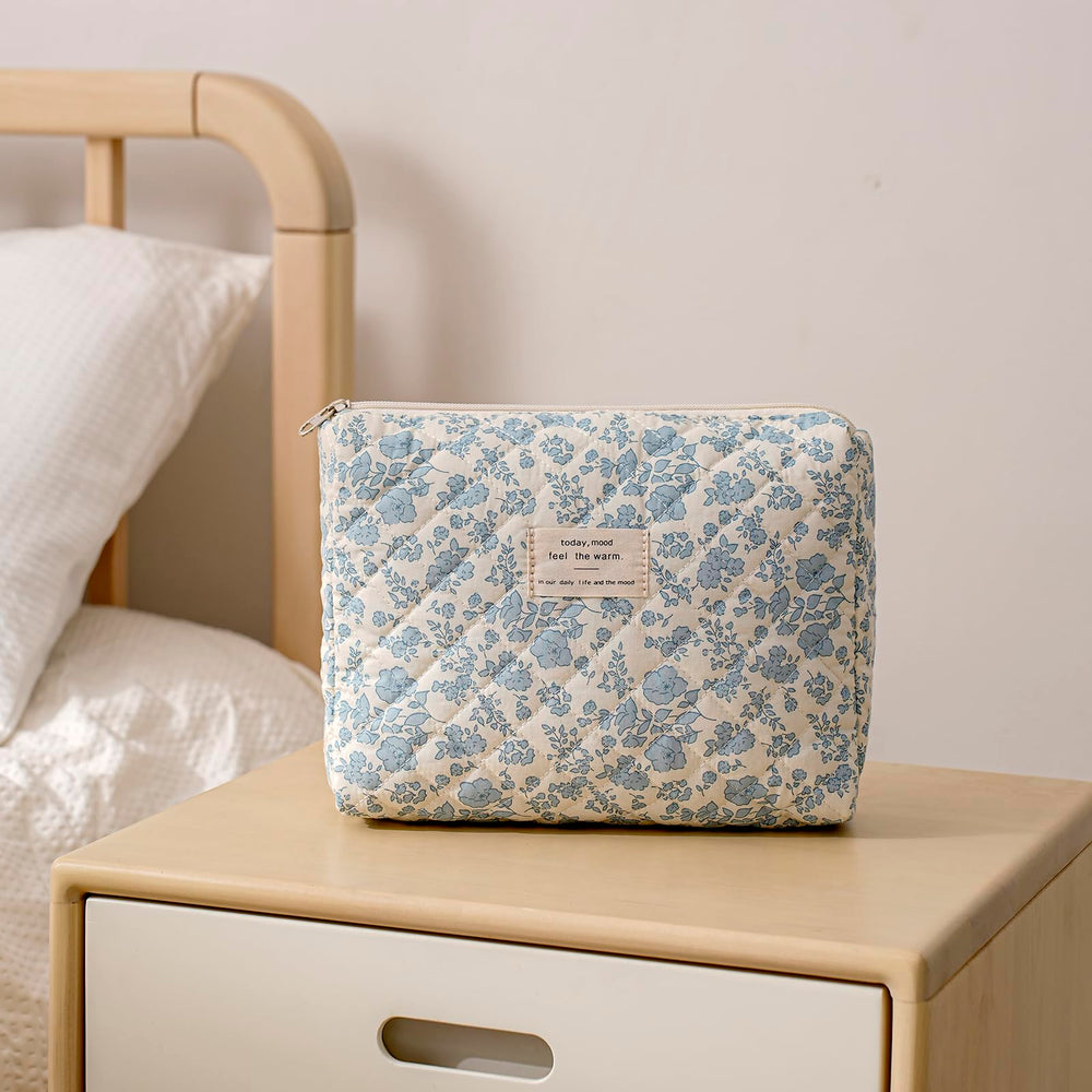 Trousse cosmétique voyage uekeboag florale bleu clair, pratique pour l'organisation.