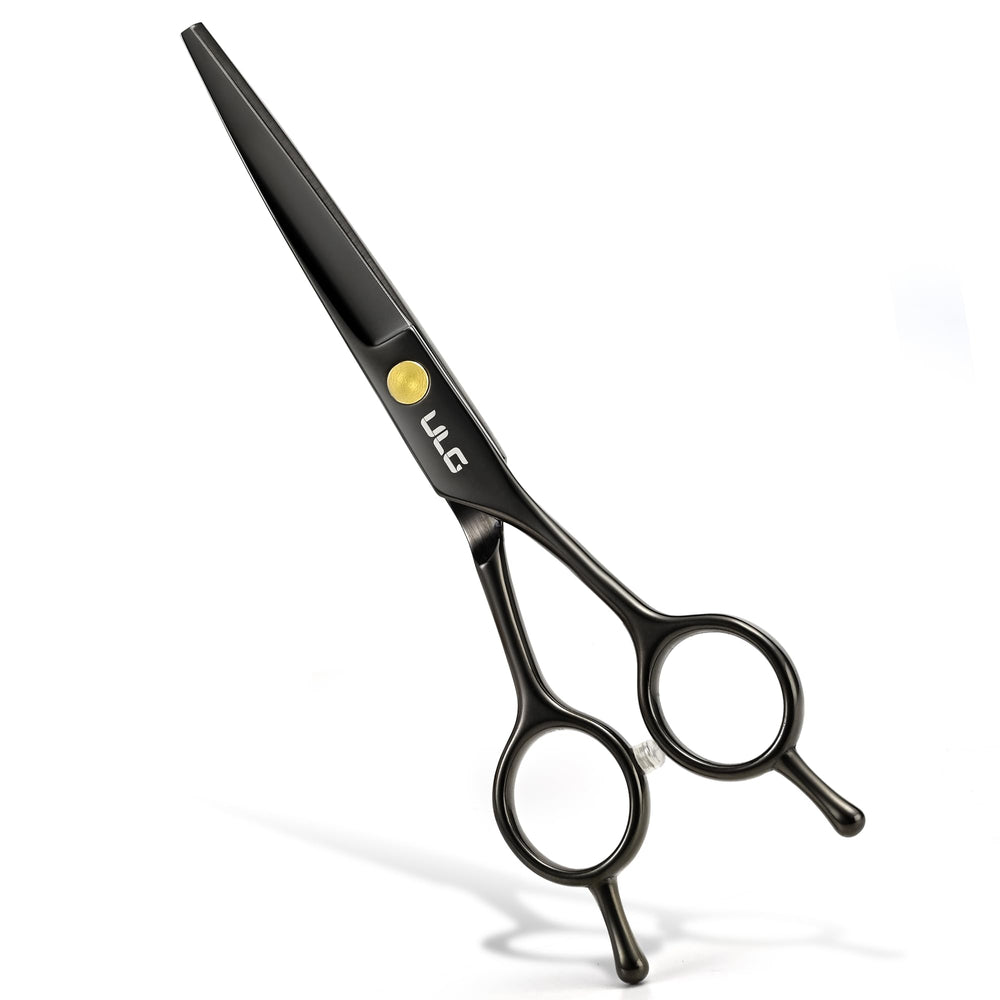 Ciseaux professionnels ULG – lames affûtées pour coupe nette et fluide des cheveux.