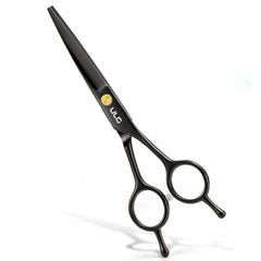 Ciseaux professionnels ULG – lames affûtées pour coupe nette et fluide des cheveux.