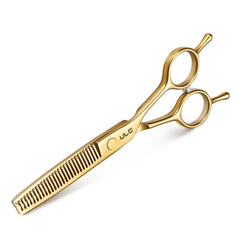 Ciseaux ULG: lames ultra-affûtées pour des coupes nettes sur tous types de cheveux.
