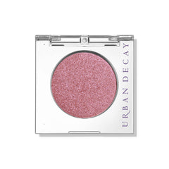 URBAN DECAY Bad Seed, rose scintillant sur paupière, pigmentation élevée et tenue durable.