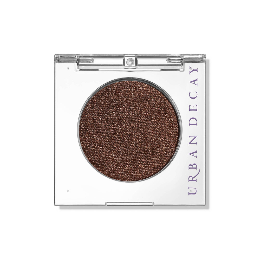 Urban Decay Ember fard cuivre métallique, tenue longue durée pour un regard captivant.
