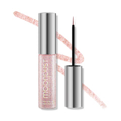 Liner liquide Moondust dUrban Decay avec pinceau fin pour des traits précis et scintillants.