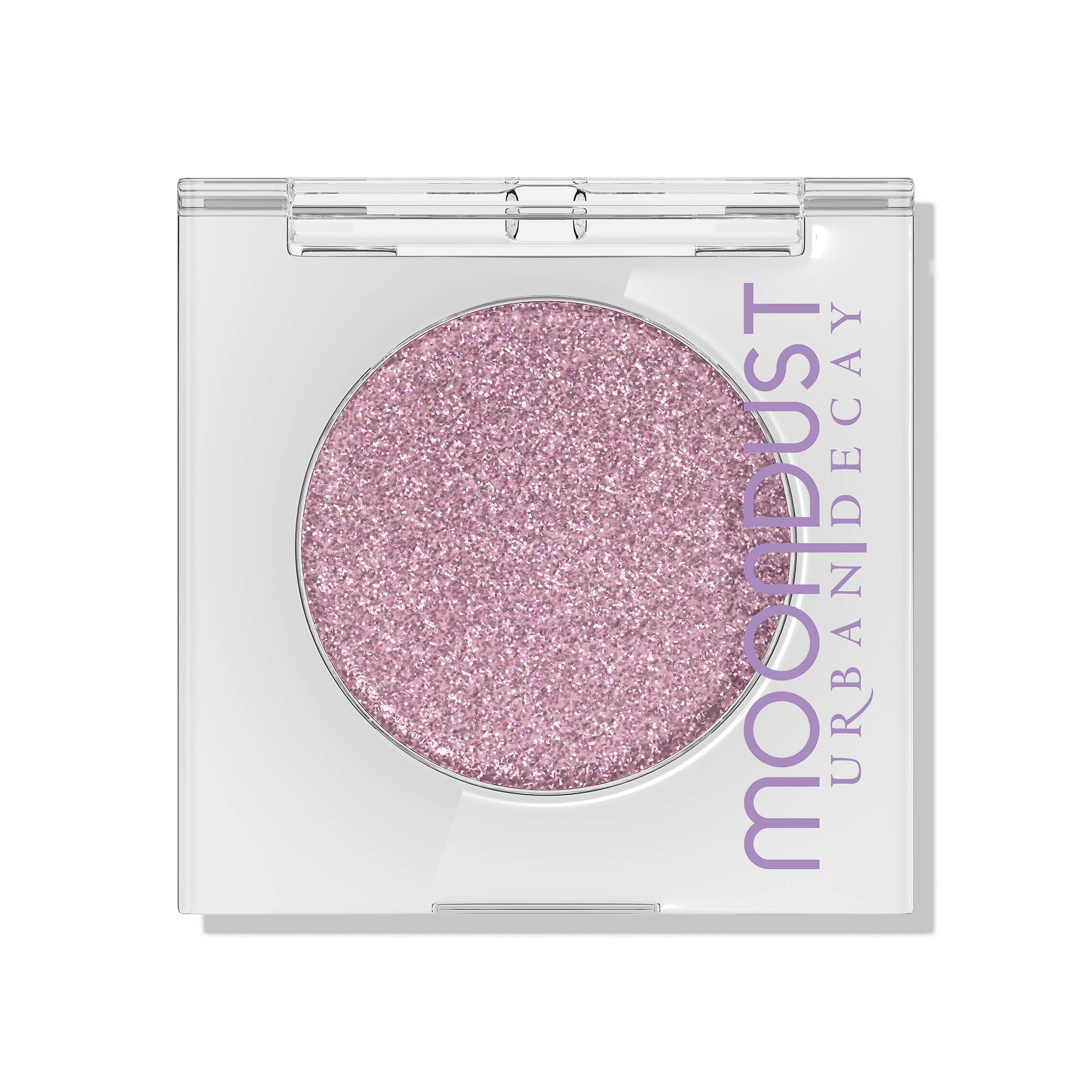 Urban Decay Moondust Space Cowboy paillettes lilas sur les paupières pour un éclat durable.