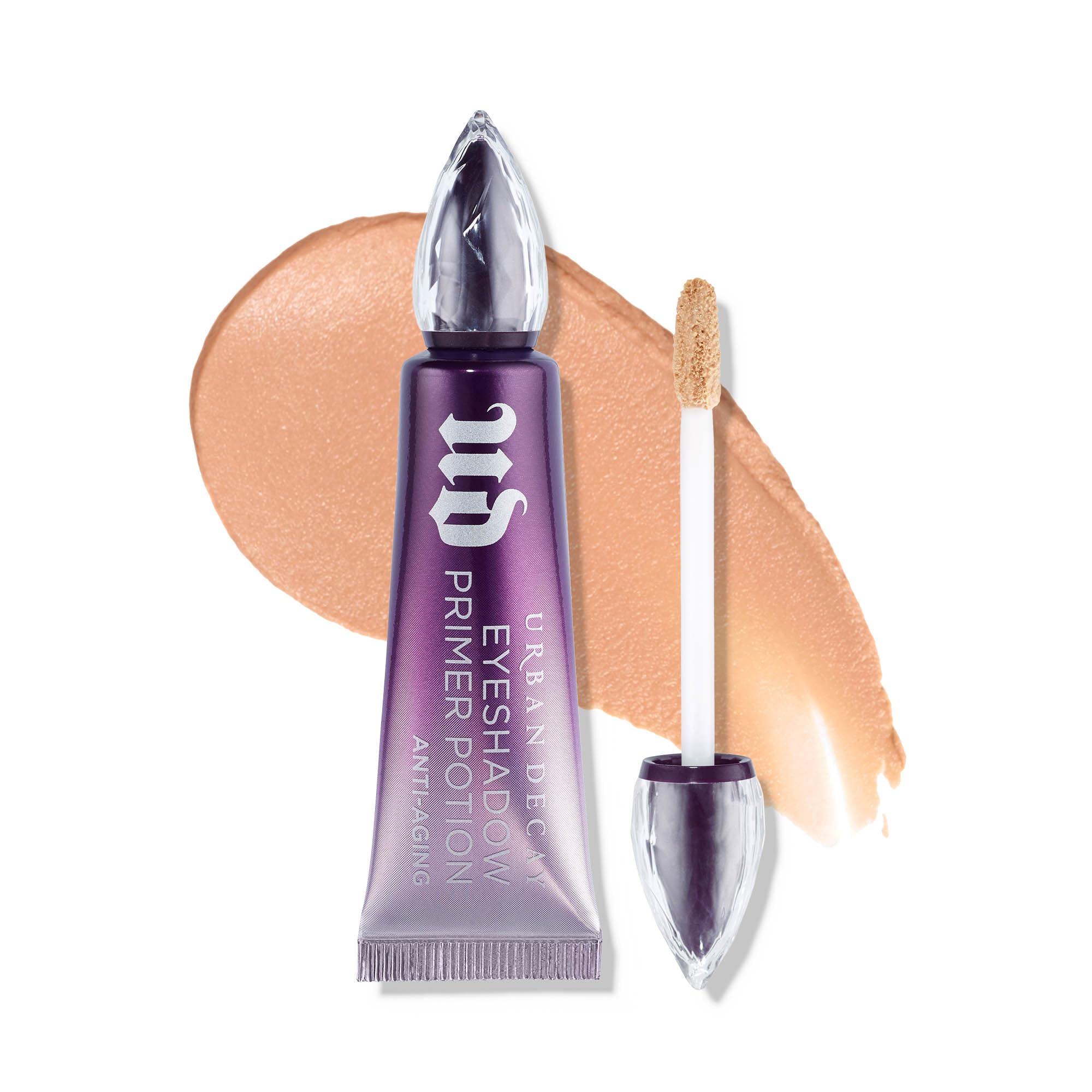 Urban Decay Primer Anti-âge Yeux Nude, embout flocké pour application précise et lissante.