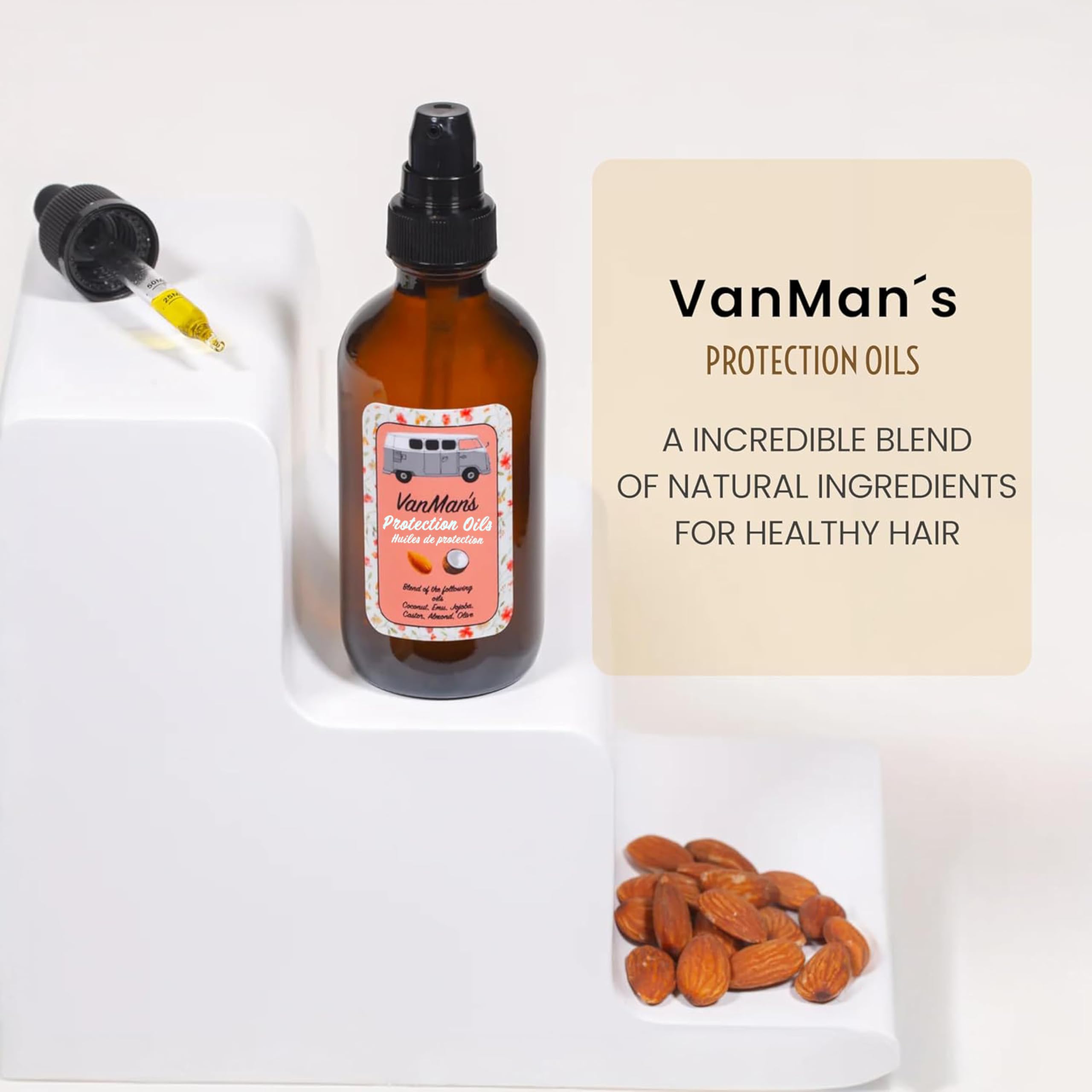 Mains appliquant le sérum VanMan Protection sur les longueurs.