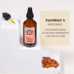 Mains appliquant le sérum VanMan Protection sur les longueurs.
