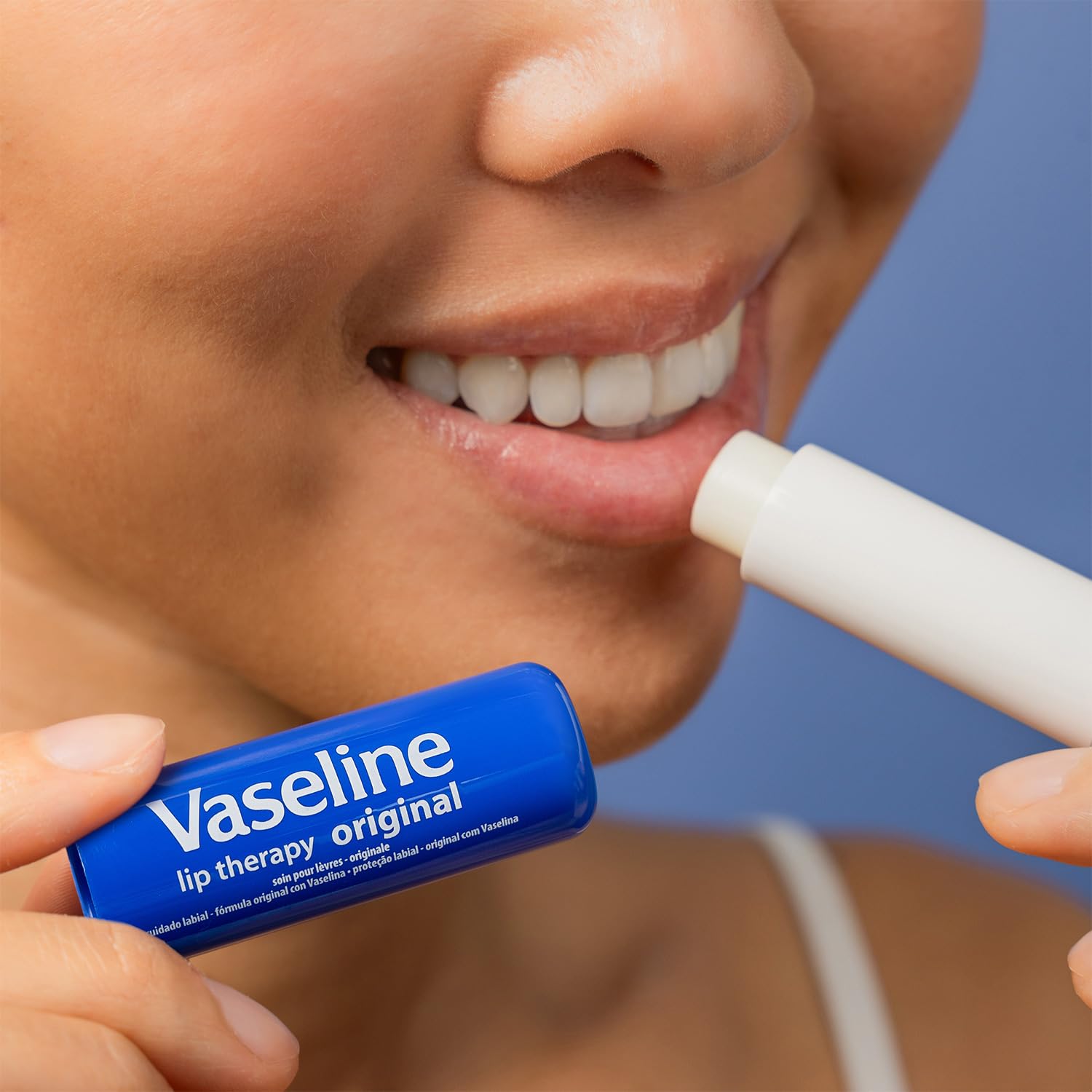 Vaseline Lip Therapy Original travel-size tube, pocket-friendly lip care.