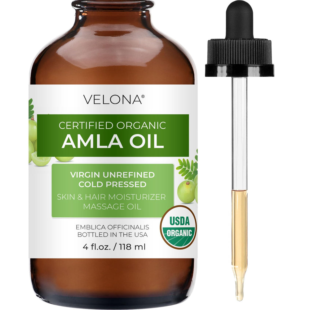 Velona Amla Huile dans sa bouteille prête à une application capillaire nourrissante.